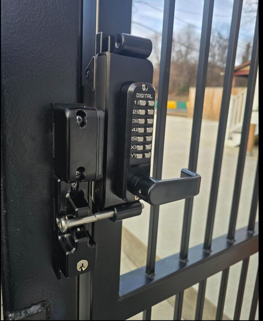 Lockey SUMO mechanical keypad gate lock on a steel pedestrian gate, installed by RBD Security
