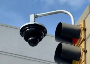 Multi-sensor and PTZ security camera on a pole-mount arm, installed by RBD Security
